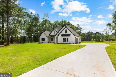 NEW CONSTRUCTION - MOVE IN READY! Welcome to newly built on Raintree Country Club in Georgia - for sale on GolfHomes.com, golf home, golf lot