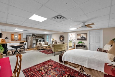 Refined design meets thoughtful functionality in this on Woodfin Ridge Golf Club in South Carolina - for sale on GolfHomes.com, golf home, golf lot