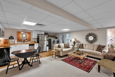 Refined design meets thoughtful functionality in this on Woodfin Ridge Golf Club in South Carolina - for sale on GolfHomes.com, golf home, golf lot