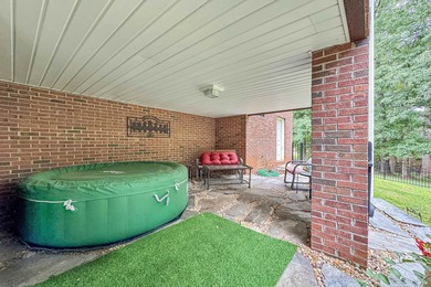 Refined design meets thoughtful functionality in this on Woodfin Ridge Golf Club in South Carolina - for sale on GolfHomes.com, golf home, golf lot