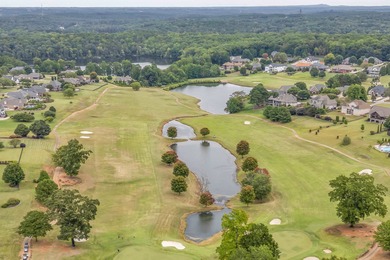 Refined design meets thoughtful functionality in this on Woodfin Ridge Golf Club in South Carolina - for sale on GolfHomes.com, golf home, golf lot