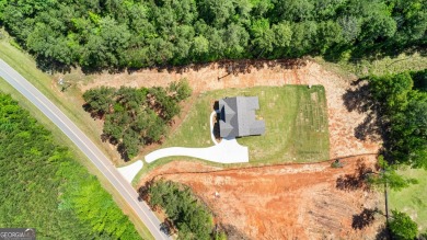 NEW CONSTRUCTION! MOVE IN READY!  *The Jamestown II* - a on Raintree Country Club in Georgia - for sale on GolfHomes.com, golf home, golf lot