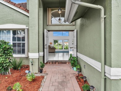 Beautiful large home in sought after Pipers Glen Estates. Part on Westchester Golf and Country Club in Florida - for sale on GolfHomes.com, golf home, golf lot