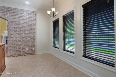 Showstopping two-story home on the pond in Squirrel Run! This on Squirrel Run Golf Courses in Louisiana - for sale on GolfHomes.com, golf home, golf lot