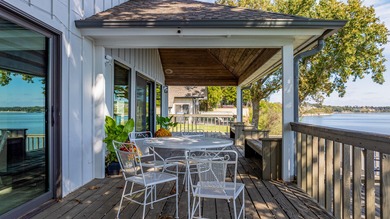 33024 Mockingbird Lane is a striking lakefront retreat that on The Coves Golf Course in Oklahoma - for sale on GolfHomes.com, golf home, golf lot