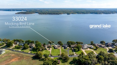 33024 Mockingbird Lane is a striking lakefront retreat that on The Coves Golf Course in Oklahoma - for sale on GolfHomes.com, golf home, golf lot