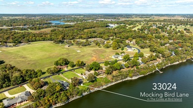 33024 Mockingbird Lane is a striking lakefront retreat that on The Coves Golf Course in Oklahoma - for sale on GolfHomes.com, golf home, golf lot