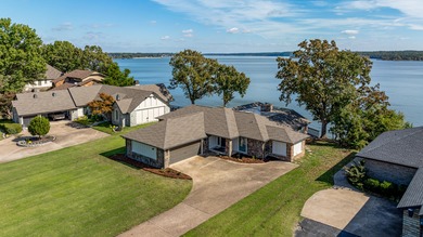 33024 Mockingbird Lane is a striking lakefront retreat that on The Coves Golf Course in Oklahoma - for sale on GolfHomes.com, golf home, golf lot