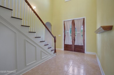 Showstopping two-story home on the pond in Squirrel Run! This on Squirrel Run Golf Courses in Louisiana - for sale on GolfHomes.com, golf home, golf lot