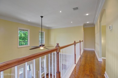 Showstopping two-story home on the pond in Squirrel Run! This on Squirrel Run Golf Courses in Louisiana - for sale on GolfHomes.com, golf home, golf lot