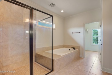 Showstopping two-story home on the pond in Squirrel Run! This on Squirrel Run Golf Courses in Louisiana - for sale on GolfHomes.com, golf home, golf lot