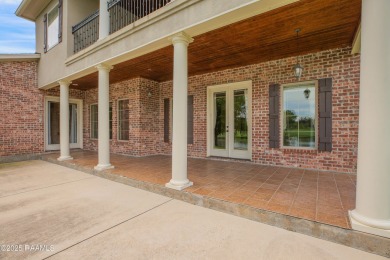 Showstopping two-story home on the pond in Squirrel Run! This on Squirrel Run Golf Courses in Louisiana - for sale on GolfHomes.com, golf home, golf lot