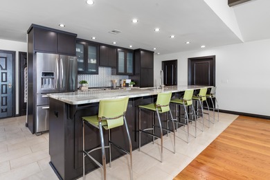 33024 Mockingbird Lane is a striking lakefront retreat that on The Coves Golf Course in Oklahoma - for sale on GolfHomes.com, golf home, golf lot