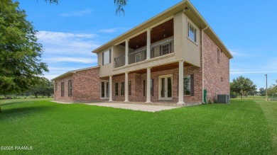 Showstopping two-story home on the pond in Squirrel Run! This on Squirrel Run Golf Courses in Louisiana - for sale on GolfHomes.com, golf home, golf lot