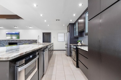 33024 Mockingbird Lane is a striking lakefront retreat that on The Coves Golf Course in Oklahoma - for sale on GolfHomes.com, golf home, golf lot