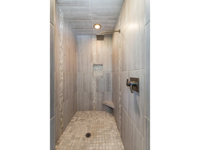 33024 Mockingbird Lane is a striking lakefront retreat that on The Coves Golf Course in Oklahoma - for sale on GolfHomes.com, golf home, golf lot