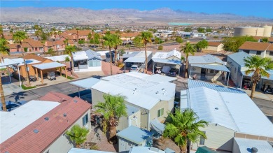 Welcome to 2000 Ramar Rd #159, a desirable corner-lot home on Riverview Golf Course in Arizona - for sale on GolfHomes.com, golf home, golf lot