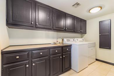 33024 Mockingbird Lane is a striking lakefront retreat that on The Coves Golf Course in Oklahoma - for sale on GolfHomes.com, golf home, golf lot