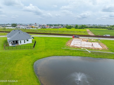 Lakeside living located in the exclusive, gated community of Le on LeTriomphe Golf and Country Club in Louisiana - for sale on GolfHomes.com, golf home, golf lot