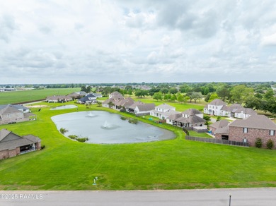 Experience lakeside living in the exclusive, gated community of on LeTriomphe Golf and Country Club in Louisiana - for sale on GolfHomes.com, golf home, golf lot