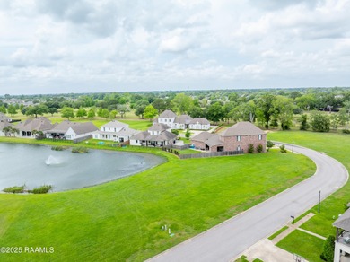 Experience lakeside living in the exclusive, gated community of on LeTriomphe Golf and Country Club in Louisiana - for sale on GolfHomes.com, golf home, golf lot