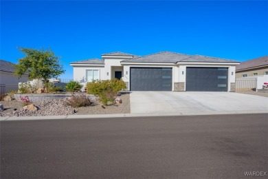 This contemporary home is located in the beautiful and gated Los on Los Lagos Golf Club in Arizona - for sale on GolfHomes.com, golf home, golf lot