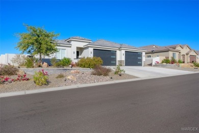 This contemporary home is located in the beautiful and gated Los on Los Lagos Golf Club in Arizona - for sale on GolfHomes.com, golf home, golf lot
