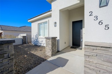 This contemporary home is located in the beautiful and gated Los on Los Lagos Golf Club in Arizona - for sale on GolfHomes.com, golf home, golf lot