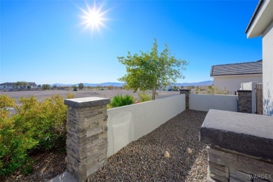 This contemporary home is located in the beautiful and gated Los on Los Lagos Golf Club in Arizona - for sale on GolfHomes.com, golf home, golf lot