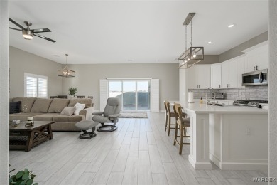 This contemporary home is located in the beautiful and gated Los on Los Lagos Golf Club in Arizona - for sale on GolfHomes.com, golf home, golf lot