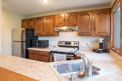 Check out this highly desired 4-bedroom, 3-bath end unit in the on Eagle Ridge Inn and Resort in Illinois - for sale on GolfHomes.com, golf home, golf lot