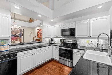 Experience luxury living in this top-floor penthouse condo in on Broken Sound Golf and Club  in Florida - for sale on GolfHomes.com, golf home, golf lot