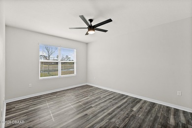 Welcome to this beautifully maintained 4 bedroom, 2 bath on Halifax Plantation Golf Club in Florida - for sale on GolfHomes.com, golf home, golf lot