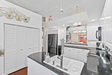 Experience luxury living in this top-floor penthouse condo in on Broken Sound Golf and Club  in Florida - for sale on GolfHomes.com, golf home, golf lot