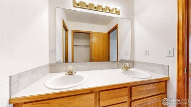 Enjoy low-maintenance mountain living in this beautifully on Estes Park Golf Course in Colorado - for sale on GolfHomes.com, golf home, golf lot