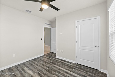 Welcome to this beautifully maintained 4 bedroom, 2 bath on Halifax Plantation Golf Club in Florida - for sale on GolfHomes.com, golf home, golf lot