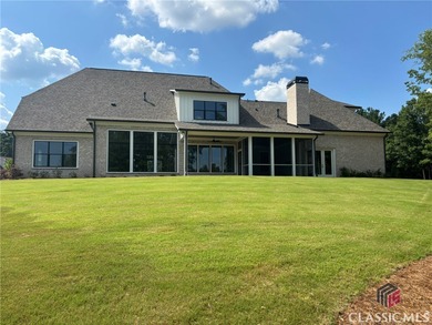 Nestled on the *Black 4* Fairway of The Georgia Club, this on The Georgia Club in Georgia - for sale on GolfHomes.com, golf home, golf lot