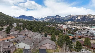 Enjoy low-maintenance mountain living in this beautifully on Estes Park Golf Course in Colorado - for sale on GolfHomes.com, golf home, golf lot