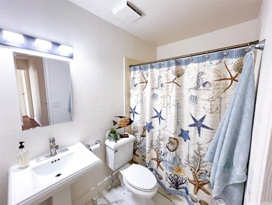 Welcome to this charming 4-bedroom, 2-bath home nestled in a on Mililani Golf Club in Hawaii - for sale on GolfHomes.com, golf home, golf lot