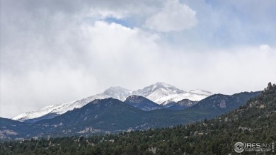Enjoy low-maintenance mountain living in this beautifully on Estes Park Golf Course in Colorado - for sale on GolfHomes.com, golf home, golf lot