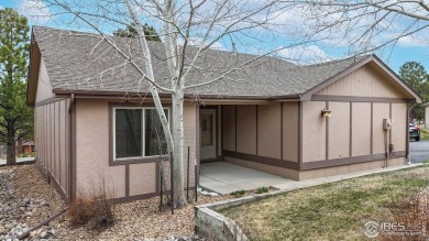 Enjoy low-maintenance mountain living in this beautifully on Estes Park Golf Course in Colorado - for sale on GolfHomes.com, golf home, golf lot