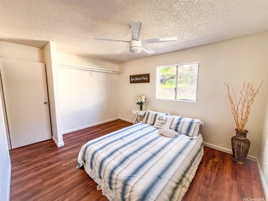 Welcome to this charming 4-bedroom, 2-bath home nestled in a on Mililani Golf Club in Hawaii - for sale on GolfHomes.com, golf home, golf lot