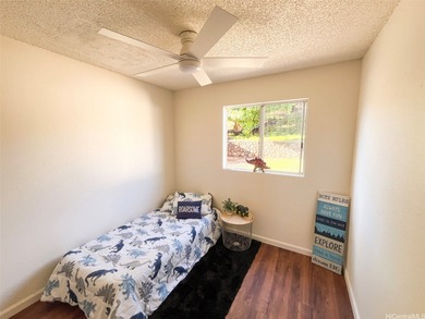 Welcome to this charming 4-bedroom, 2-bath home nestled in a on Mililani Golf Club in Hawaii - for sale on GolfHomes.com, golf home, golf lot