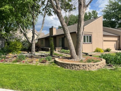 As you step in inside, you are greeted with a spacious layout on Fort Dodge Country Club in Iowa - for sale on GolfHomes.com, golf home, golf lot