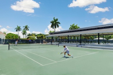 Experience luxury living in this top-floor penthouse condo in on Broken Sound Golf and Club  in Florida - for sale on GolfHomes.com, golf home, golf lot