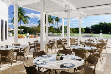 Experience luxury living in this top-floor penthouse condo in on Broken Sound Golf and Club  in Florida - for sale on GolfHomes.com, golf home, golf lot