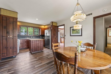 Located at the end of Belgrade Lakes Village, 14 Lakeshore Drive on Belgrade Lakes Golf Club in Maine - for sale on GolfHomes.com, golf home, golf lot