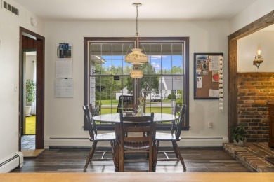 Located at the end of Belgrade Lakes Village, 14 Lakeshore Drive on Belgrade Lakes Golf Club in Maine - for sale on GolfHomes.com, golf home, golf lot