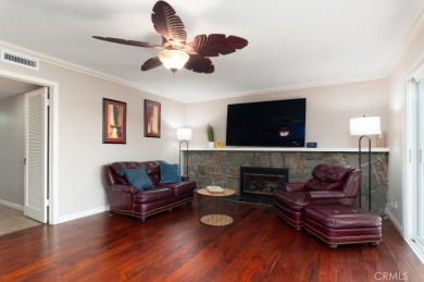 Step inside to find two expansive living areas, a large kitchen on Friendly Hills Country Club in California - for sale on GolfHomes.com, golf home, golf lot