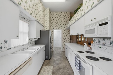 PENDING.  Enjoy SPECTACULAR GOLF COURSE VIEWS from this light on Timber Pines Golf Course in Florida - for sale on GolfHomes.com, golf home, golf lot